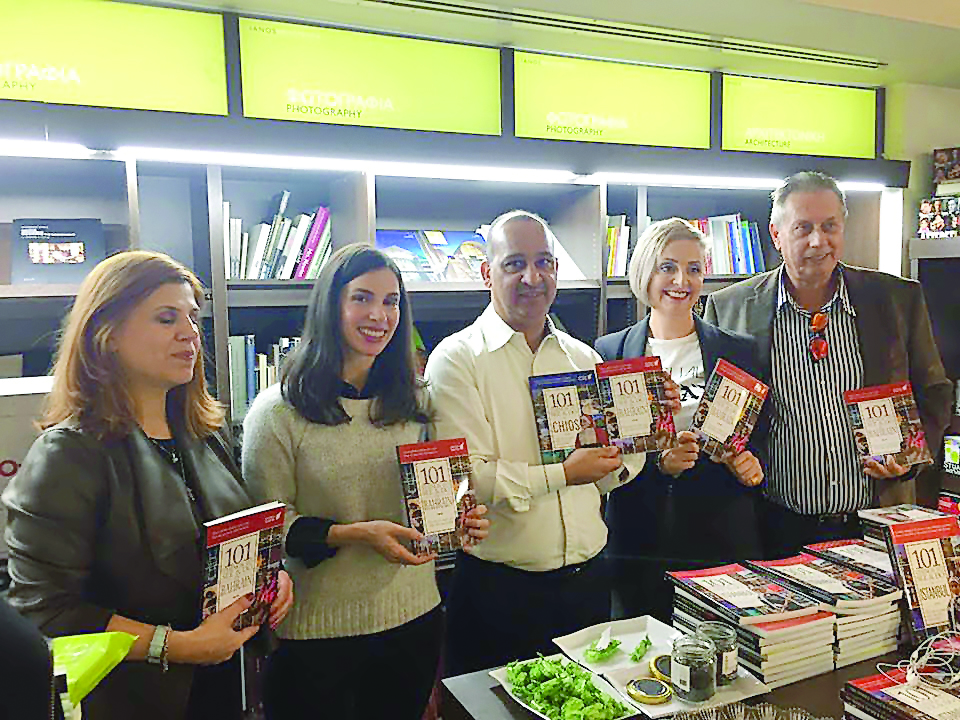 Ali Mushaima (centre) of Arab World Tours, and other officials at the book launch ceremony in Athens. 
