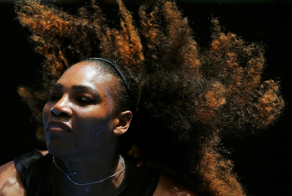 Tennis - Australian Open - Melbourne Park, Melbourne, Australia - 17/1/17 Serena Williams of the U.S. serves during her Women's singles first round match against Switzerland's Belinda Bencic. REUTERS/Jason Reed