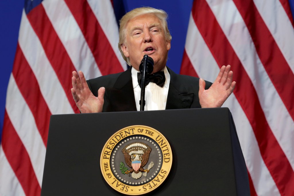 U.S. President Donald Trump speaks at the Armed Services Ball in Washington, U.S., January 20, 2017. REUTERS/Yuri Gripas
