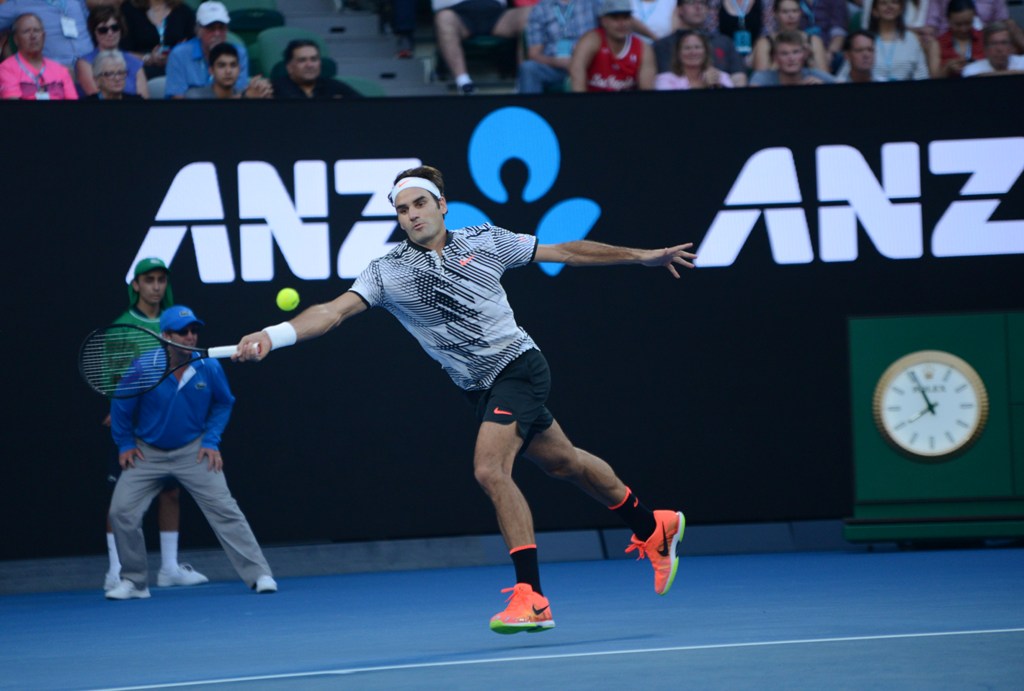 Roger Federer of Switzerland returns the ball to Kei Nishikori (not seen) of Japan during their men's singles match of the Australian Open tennis tournament at Hisense Arena in Melbourne, Australia on January 22, 2017. ( Recep ?akar - Anadolu Agency )
