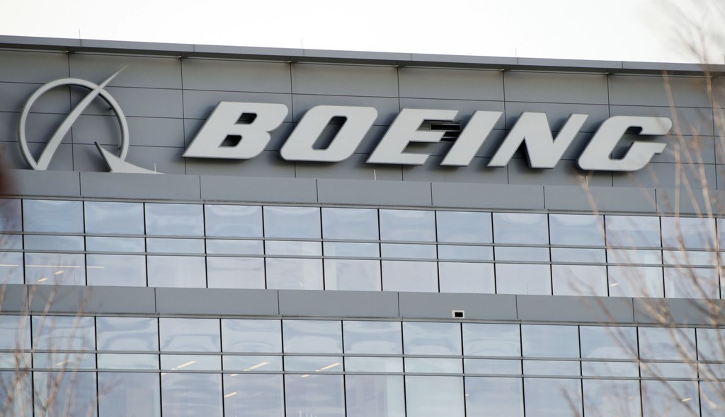(FILES) This file photo taken on December 13, 2016 shows the logo of aerospace giant Boeing is seen on Boeing's Government Operations office in Arlington, Virginia. Boeing projected January 25, 2017 higher commercial aircraft deliveries in 2017 compared w