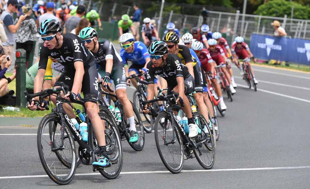 Three-time Tour de France winner Britain's Chris Froome of Team Sky (L) takes part in Race Melbourne on the first day of the Cadel Evan Great Ocean Road Race cycling event in Melbourne on January 26, 2017.  AFP / Mal Fairclough