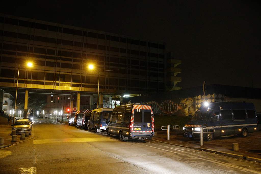 Cars of the French gendarmerie are seen parked in front of a shopping mall at the Rose des Vents district, also known as the Cite des 3000 (City of 3000), in Aulnay-sous-Bois, northeast of Paris. AFP / GEOFFROY VAN DER HASSELT
