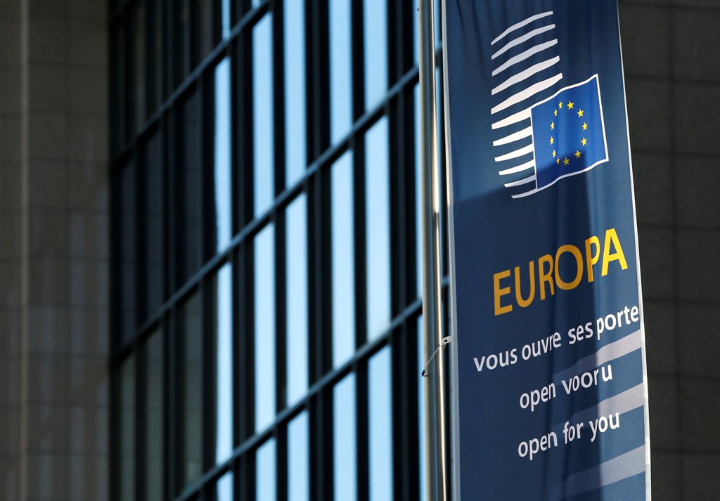 FILE PHOTO:A flag is seen outside the European Council headquarters on the eve of a EU Summit in Brussels, Belgium December 14, 2016. REUTERS/Yves Herman/File Photo
