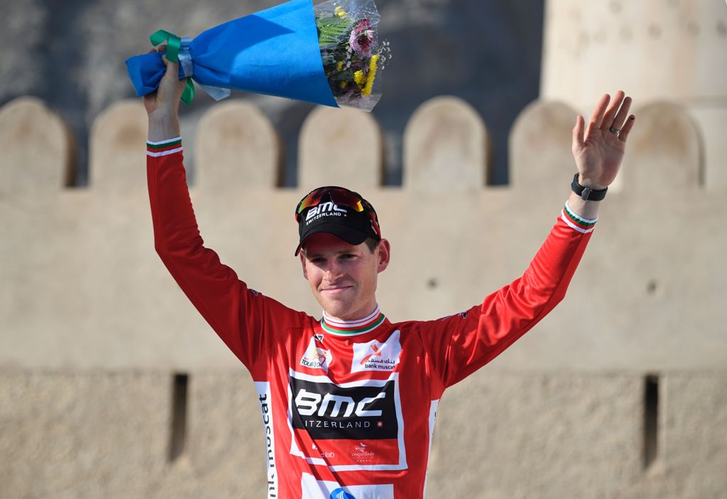 Belgium's Ben Hermans from BMC Racing Team celebrates during the victory ceremony of the 5th stage of the 8th edition of the cycling Tour of Oman between Samail and Jebel Akhdhar on February 18, 2017. / AFP / Eric FEFERBERG
