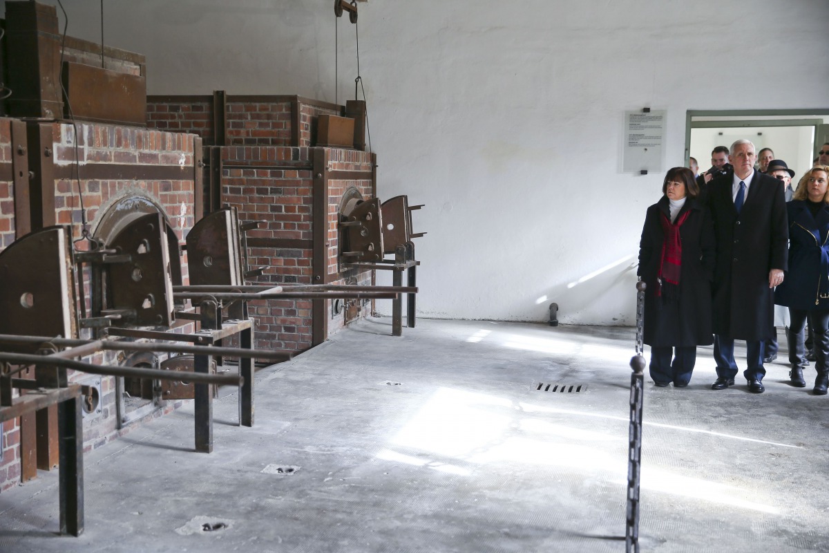 U.S. Vice President Mike Pence, his wife Karen and daughter Charlotte, visit the crematorium at former German Nazi concentration camp in Dachau near Munich, Germany February 19, 2017. REUTERS/Michael Dalder