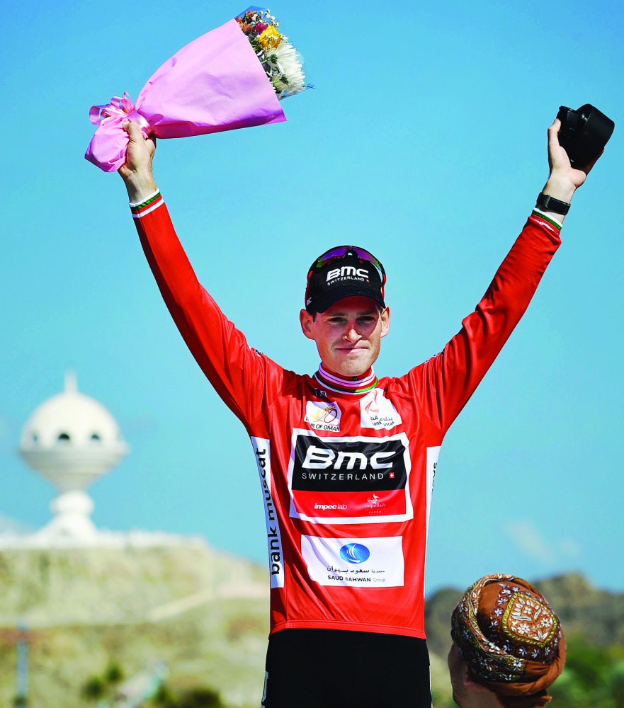 Belgian Ben Hermans celebrates his Tour of Oman victory in Muscat yesterday.