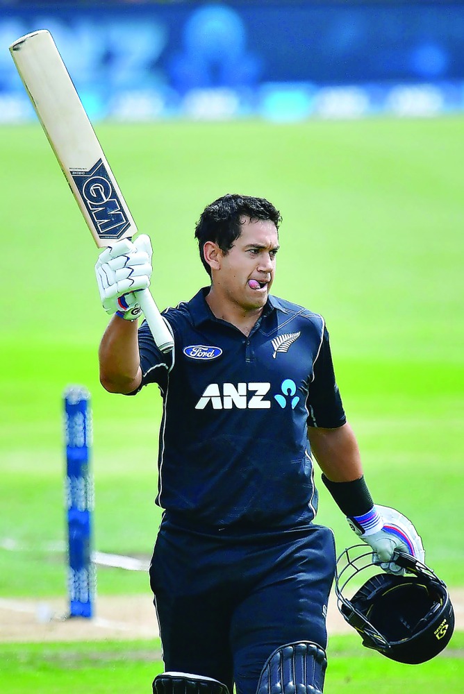 New Zealand's Ross Taylor celebrates his century during the second one-day international against South Africa at the Hagley Park Oval in Christchurch yesterday. 