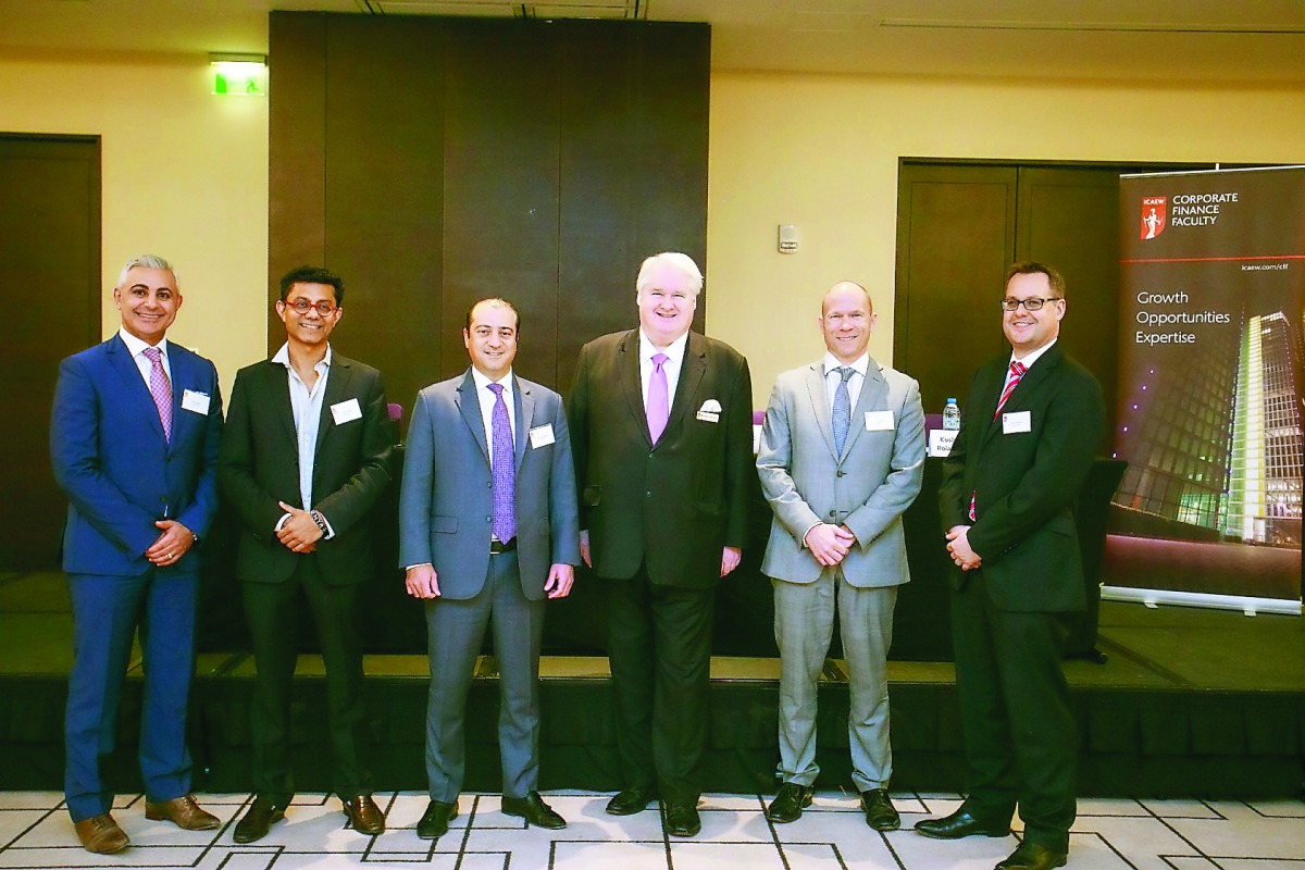 Panellists of the roundtable discussion on raising capital in the GCC pose for a group picture at the JW Marriott Marquis Hotel in Dubai. 