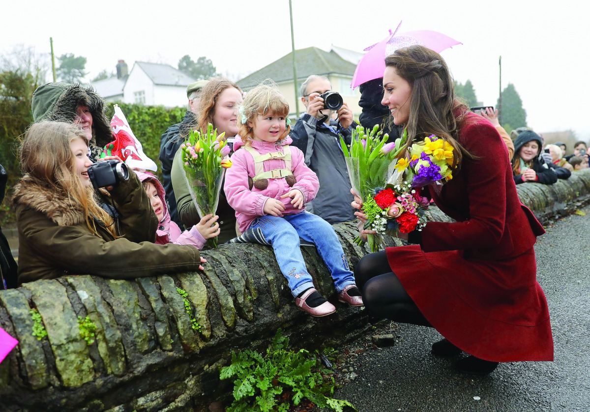Britain's Catherine, Duchess of Cambridge, meets members of the public after a visit to Caerphilly Family Intervention Team (FIT) to learn about their work with children with emotional and behavioural difficulties, in Wales, yesterday.