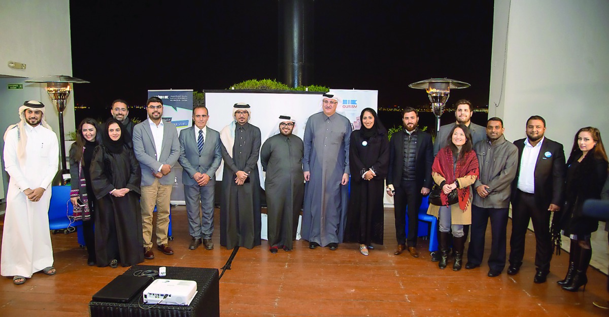 Senior officials of QDB, QBIC, and QTA posing for a group photo with the other participants at the ‘QBIC Tourism Speaker Series’ event.