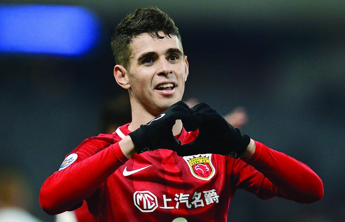 Shanghai SIPG' Brazilian midfielder Oscar celebrates after scoring during the AFC Asian Champions League group football match against Australia's Western Sydney Wanderers in Shanghai yesterday. 