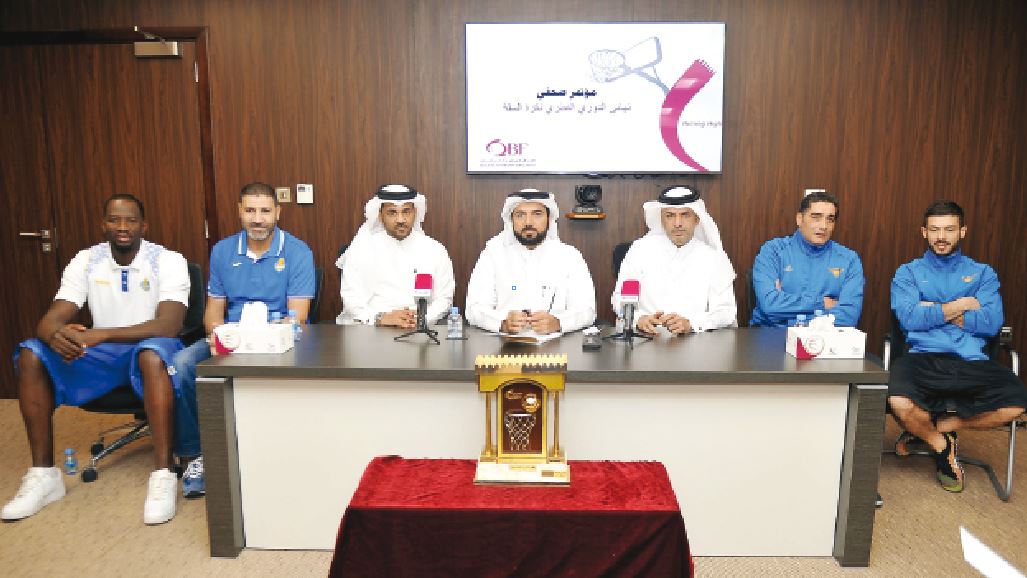 (From left) Al Gharafa Basketball team player Omar Abdul Qader and Coach  Koussay Hatem, Saleh Mabrook, Basketball Director, Ali Saeed Almalki, Secretary General QBF, Khalid Al Mohanadi Team Manager, Hatem Mamlouk Coach of El Jaish team and Fadi Hani of A