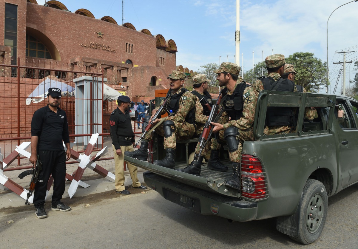 Pakistani soldiers patrol outside the Gaddafi Cricket Stadium in Lahore on February 28, 2017, ahead of the final cricket match of the Pakistan Super League (PSL). Pakistan Cricket Board (PCB) and officials of the league have been adamant that the March 5 