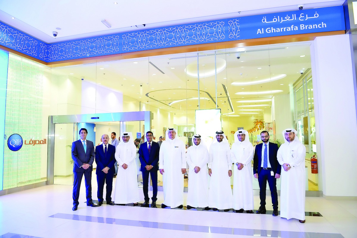QIB officials at the new branch.