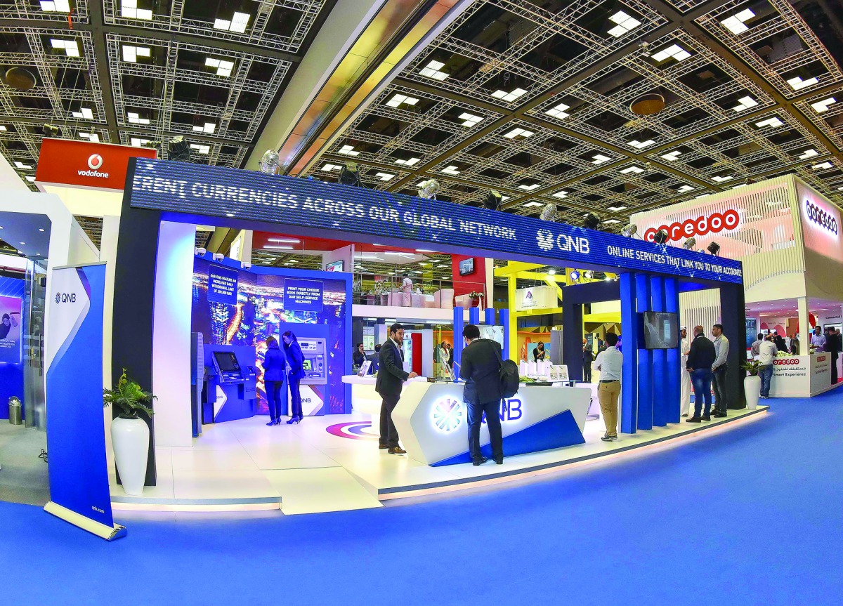 Visitors at the QNB pavilion at the QITCOM exhibition and conference.