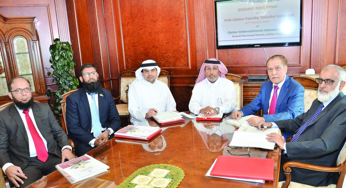 Sheikh Ali bin Abdullah bin Thani Al Thani (third right), Chairman of Pak-Qatar Takaful Group, Abdulbasit Ahmad Al Shaibei (third left) and other senior officials of the Group during a board meeting.
