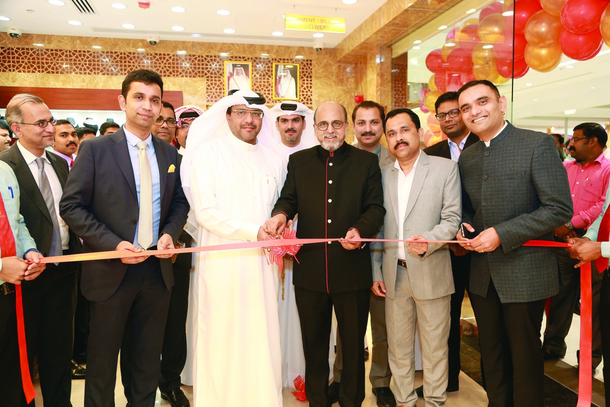 Dr R Seetharaman (third right), CEO, Doha Bank, inaugurating the new showroom.
