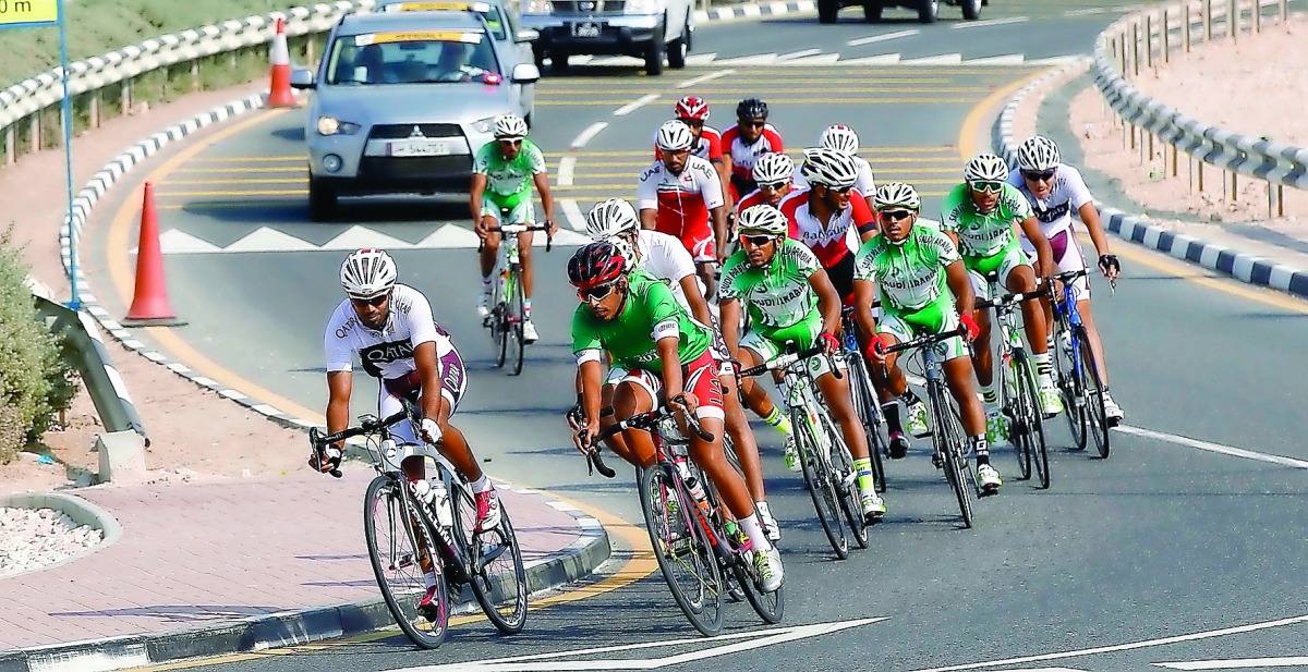 A pack of riders are negotiating the final bend during the GCC Cycling Championship, in Dukhan in this file picture of 2016.