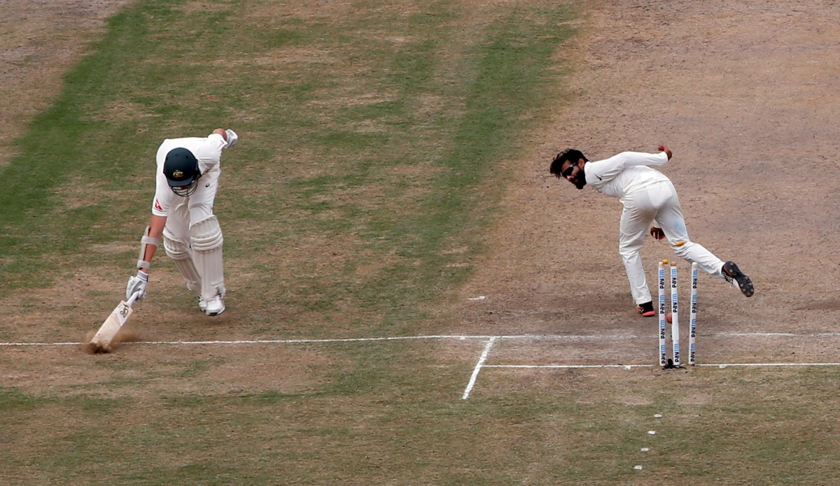 Australia's Josh Hazlewood (L) is run out by India's Ravindra Jadeja. (REUTERS/Adnan Abidi)