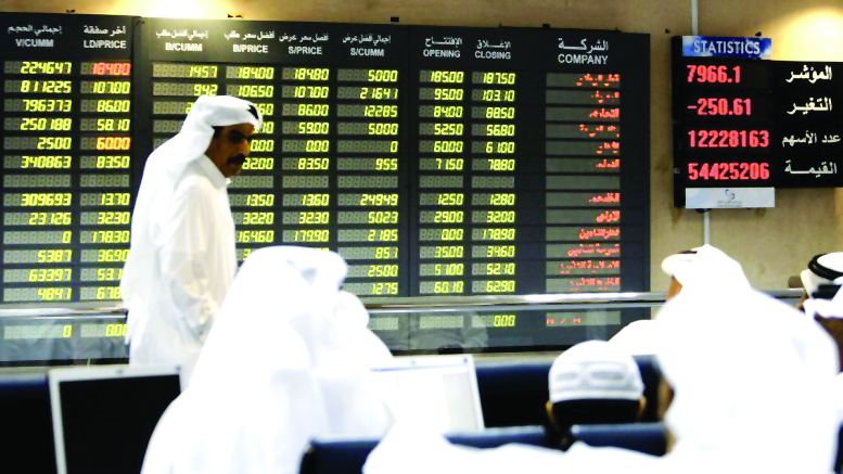 Traders seen at Qatar Stock Exchange in the file picture. 
