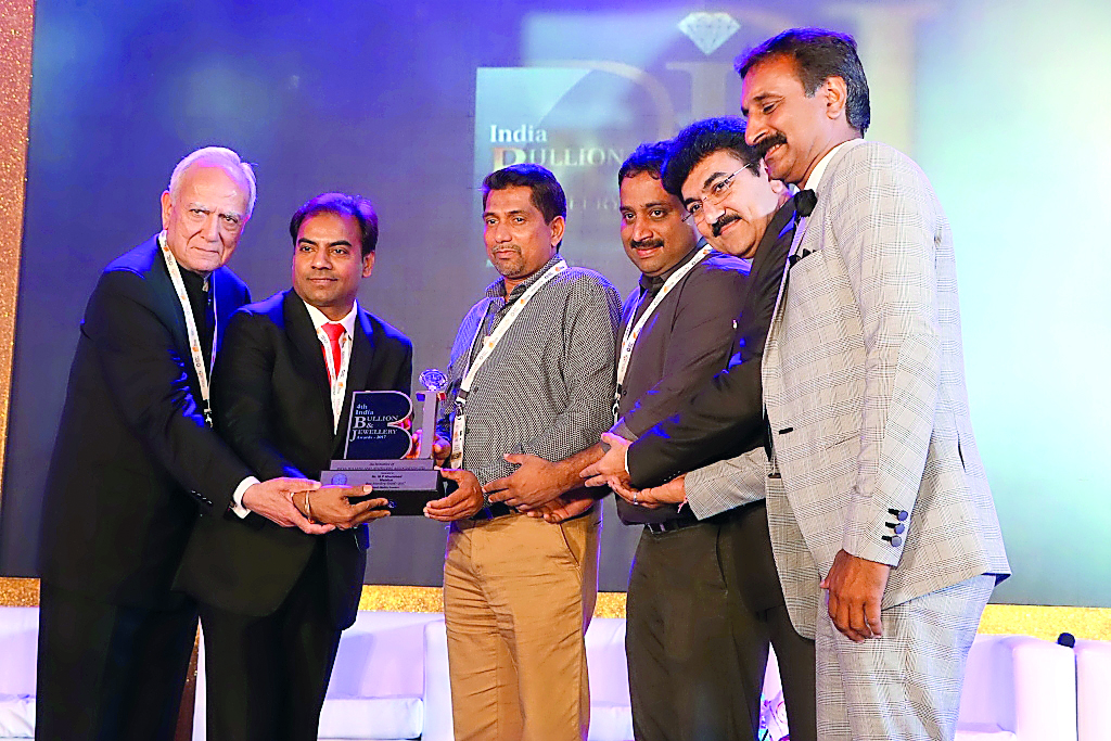 Malabar Gold & Diamonds officials pose for a group photo after receiving ‘Best Jewellery Brand Award’ from India Bullion and Jewellers Association in Mumbai.