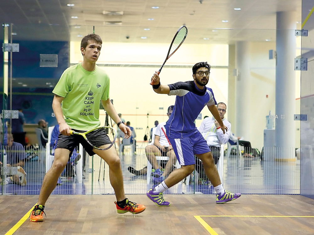 Qatar's Syed Azlan Amjad (right) in action during the second Aspire Academy Professional Squash Association (PSA) Satellite Tournament at the Academy’s squash courts on Thursday. 