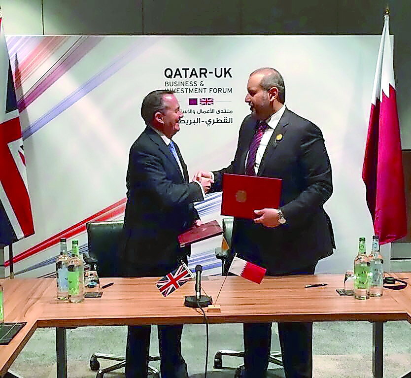 Minister of Economy and Commerce, H E Sheikh Ahmed bin Jassim Al Thani (right) and Dr Liam Fox, Secretary of State for International Trade, UK, during the MoU signging ceremony held on the sideline of Qatar-UK Business and Investment Forum held in Birming