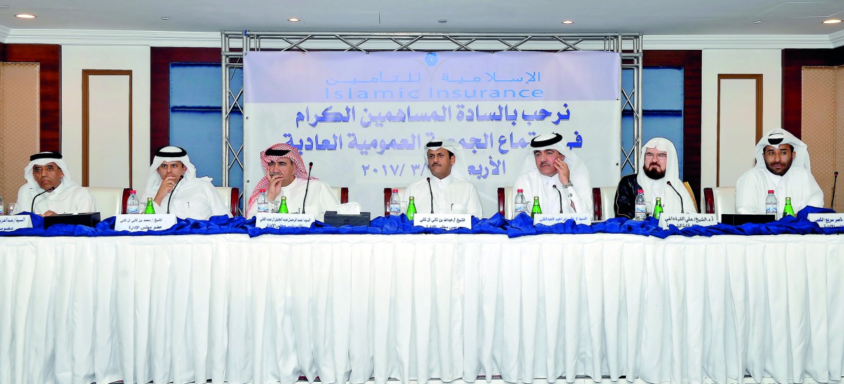 Sheikh Abdullah bin Thani Al Thani (centre), Chairman of Qatar Islamic Insurance Company and other senior officials at Company's AGM held at Ezdan Towers, yesterday.