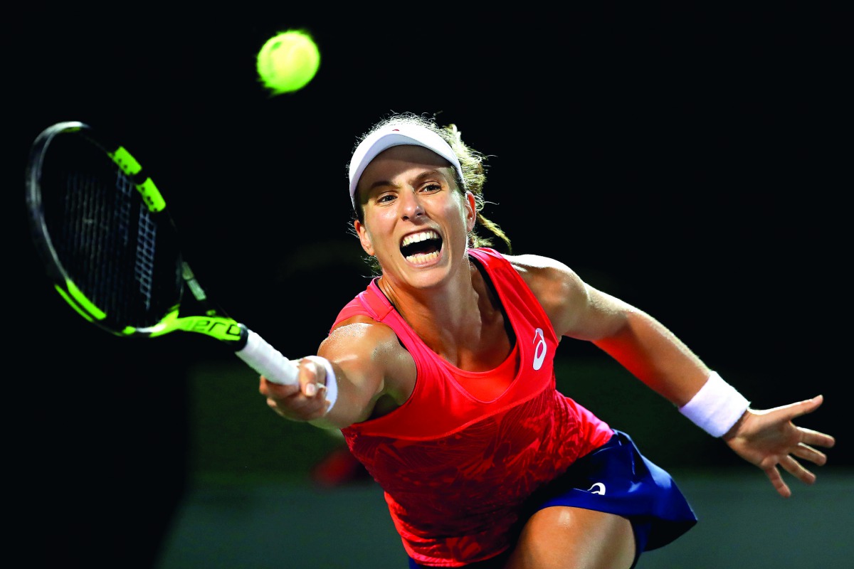 Johanna Konta of Great Britain stretches for a forehand in her match against Venus Williams of USA in the semi finals at Crandon Park Tennis Center yesterday in Key Biscayne, Florida.