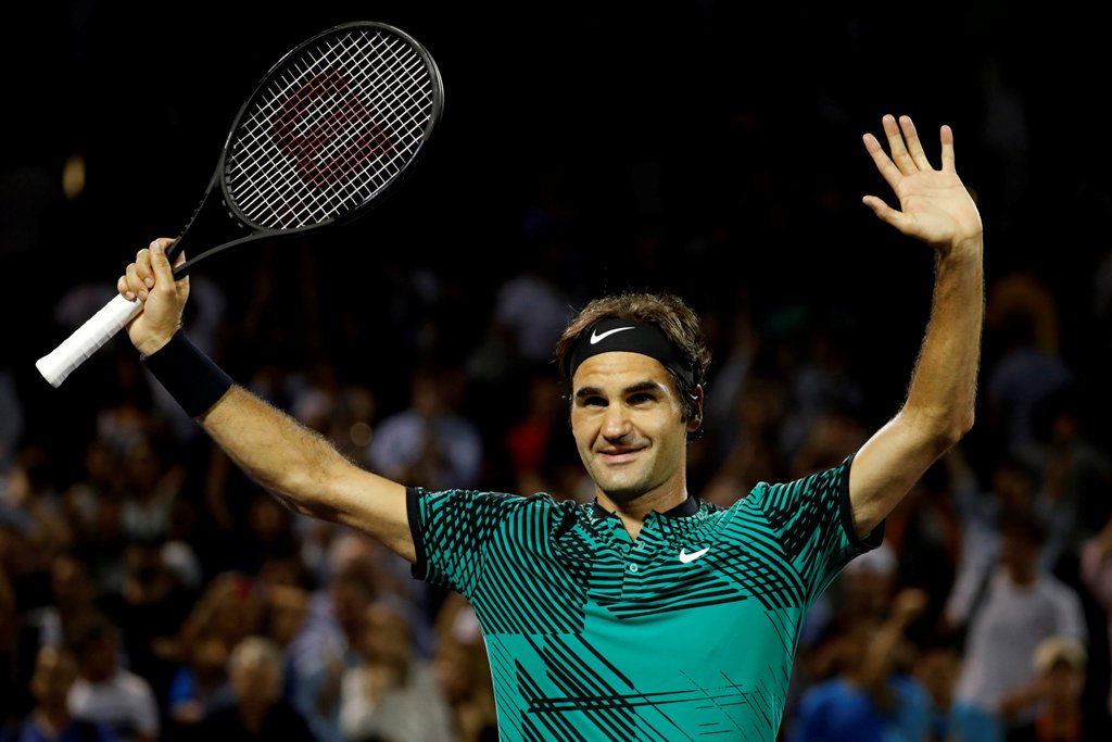 Roger Federer of Switzerland waves to the crowd after his match against Nick Kyrgios of Australia (not pictured) during a men's singles semi-final in the 2017 Miami Open at Brandon Park Tennis Center. Federer won 7-6(9) 6-7(9) 7-6(5). Geoff Burke
