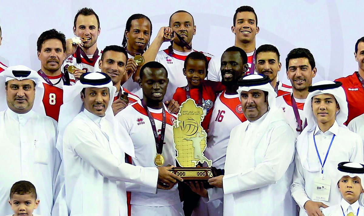Al Arabi players receiving the Qatar Cup trophy during the presentation ceremony. Al Arabi notched an impressive three sets to one win over Al Rayyan to win the Qatar Cup at the Women’s Sports Committee Hall at Aspire Dome.