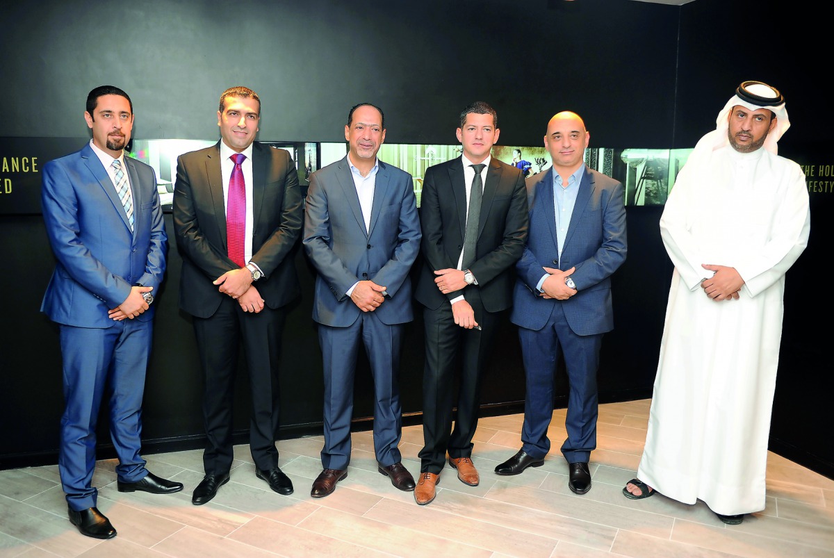 Fadi Barakeh (third right), General Manager of Al Asmakh Real Estate with other officials during the launch of Paramount Residences Doha The Pearl, yesterday. Pic: Abdul Basit / The Peninsula