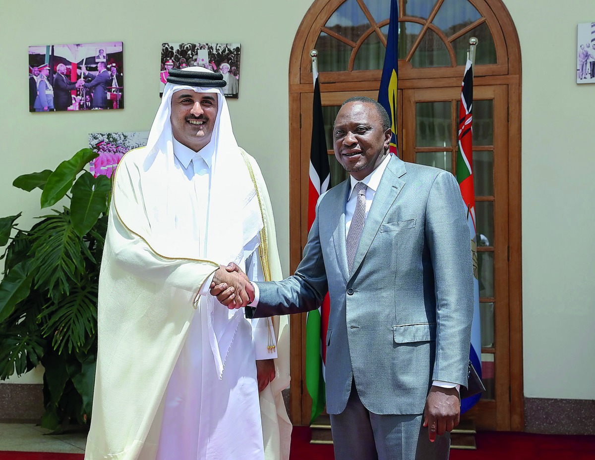 Emir H H Sheikh Tamim bin Hamad Al Thani with President of the Republic of Kenya, Uhuru Kenyatta,  at the Presidential Palace in Nairobi, yesterday.