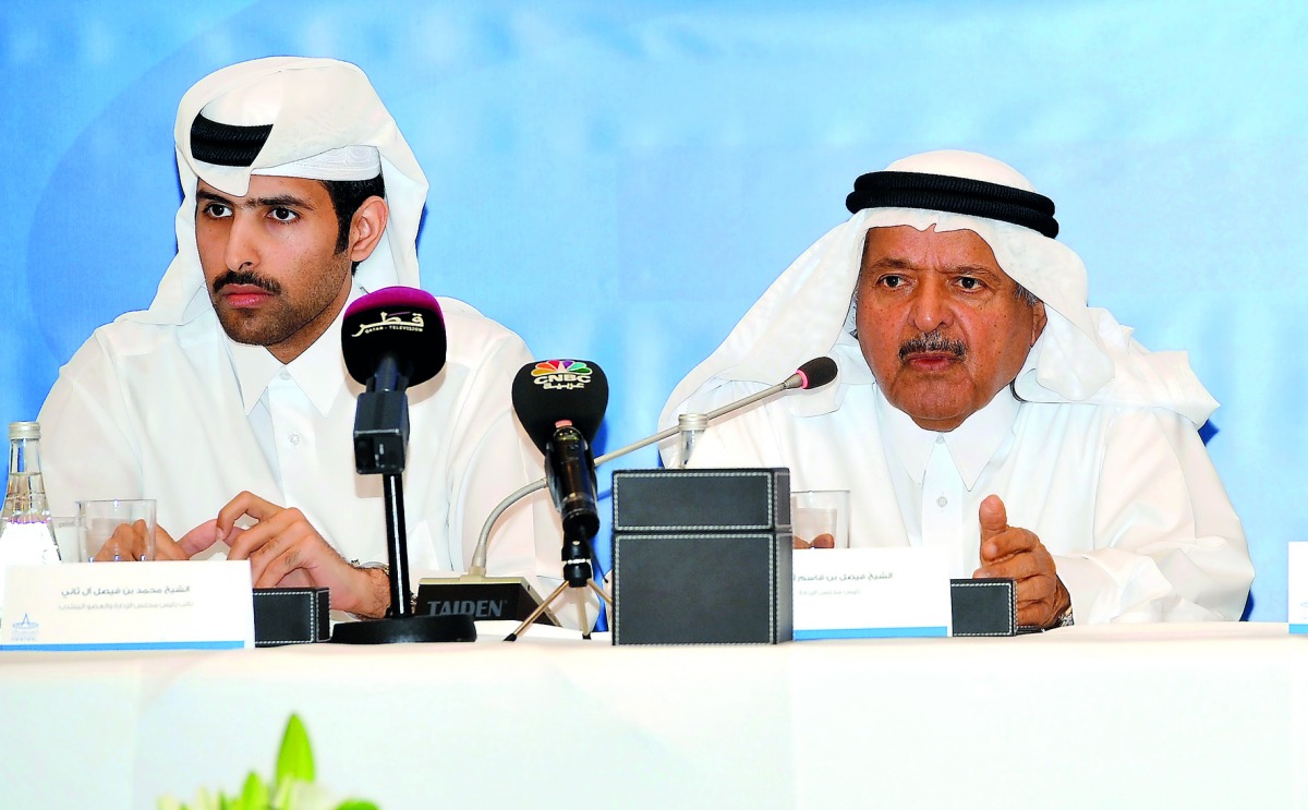 Sheikh Faisal bin Qassim Al Thani. (right) Founder and Chairman of Aamal Company and Sheikh Mohamed bin Faisal Al Thani, Vice-Chairman and Managing Director , at the Aamal Company's Annual General Meeting at Shangri-La Hotel, yesterday.   Pic: Kammutty VP