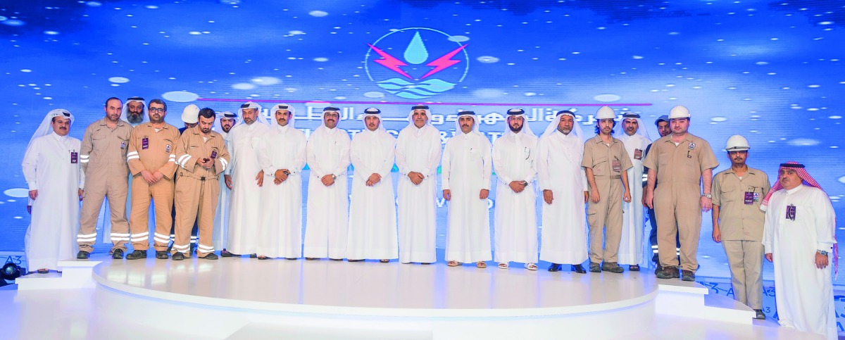 Prime Minister and Interior Minister H E Sheikh Abdullah bin Nasser bin Khalifa Al Thani and Minister of Energy and Industry and Chairman of Qatar Electricity and Water Company (QEWC) H E Dr Mohammed bin Saleh Al Sada with other officials at the ceremony.