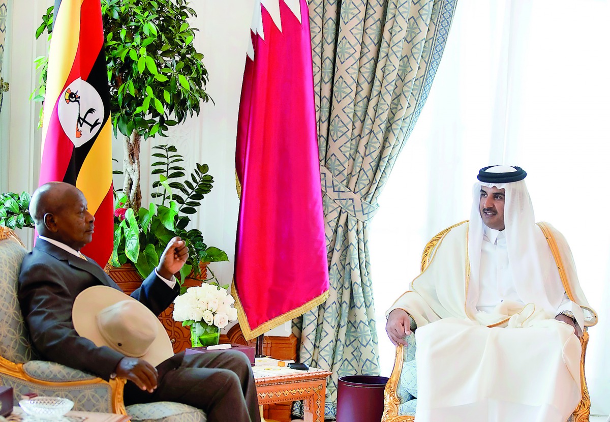 Emir H H Sheikh Tamim bin Hamad Al Thani and President of the Republic of Uganda, Yoweri Kaguta Museveni, holding talks at the Emiri Diwan yesterday.