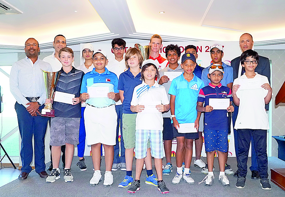 The podium winners at the Qatar Golf Association organised Qatar Junior Open 2017 pose for a picture with officials at Doha Golf Club Championship and Academy Course on Saturday. More than 40 participants of different age groups and categories competed in