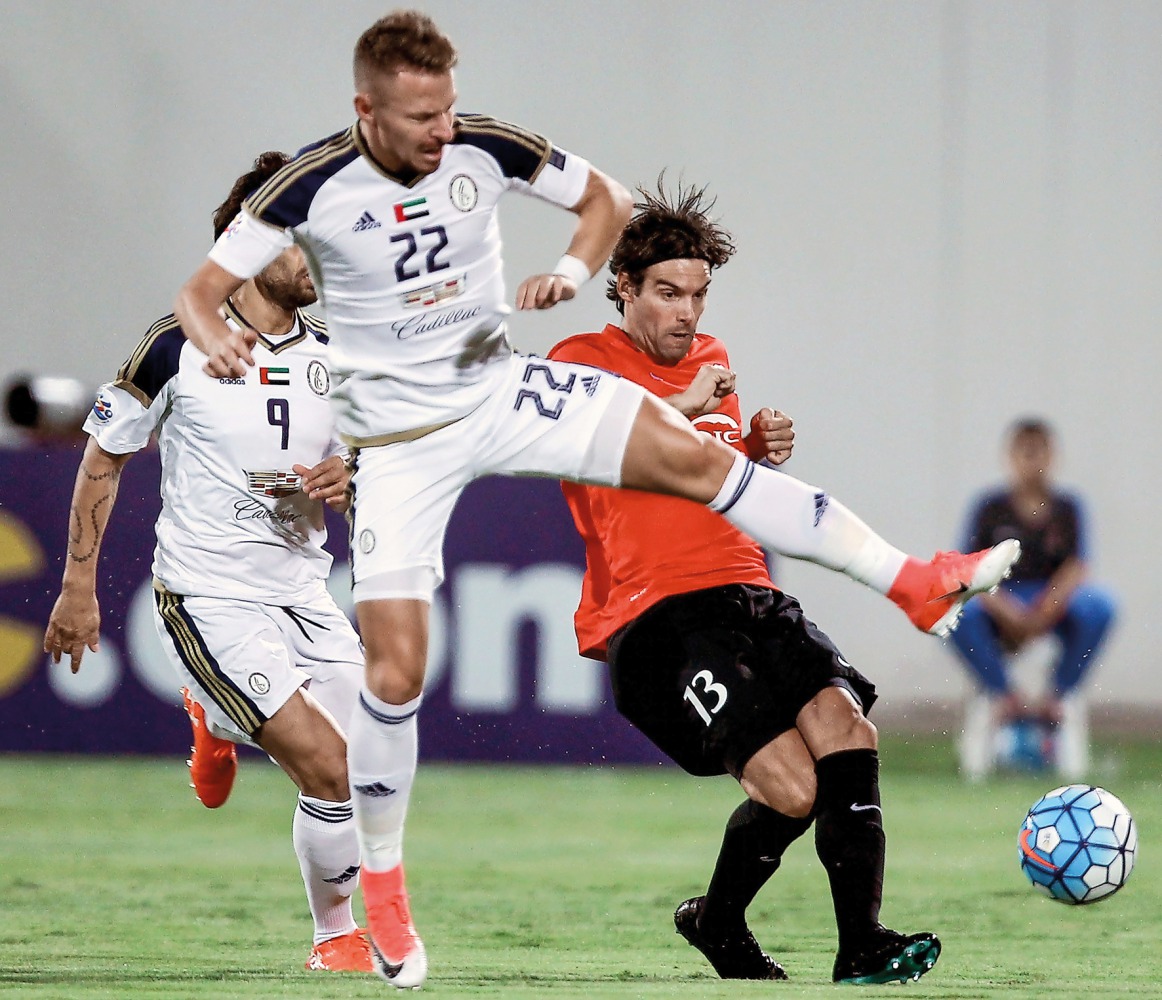 Action from yesterday's match between Al Rayyan and Al Wahda.