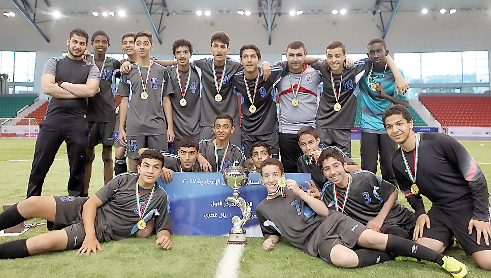 The players of  Amza Ibn Abdulmutalib School, winners of the Aspire Football Festival for Preparatory Schools pose for a picture in Doha yesterday. 