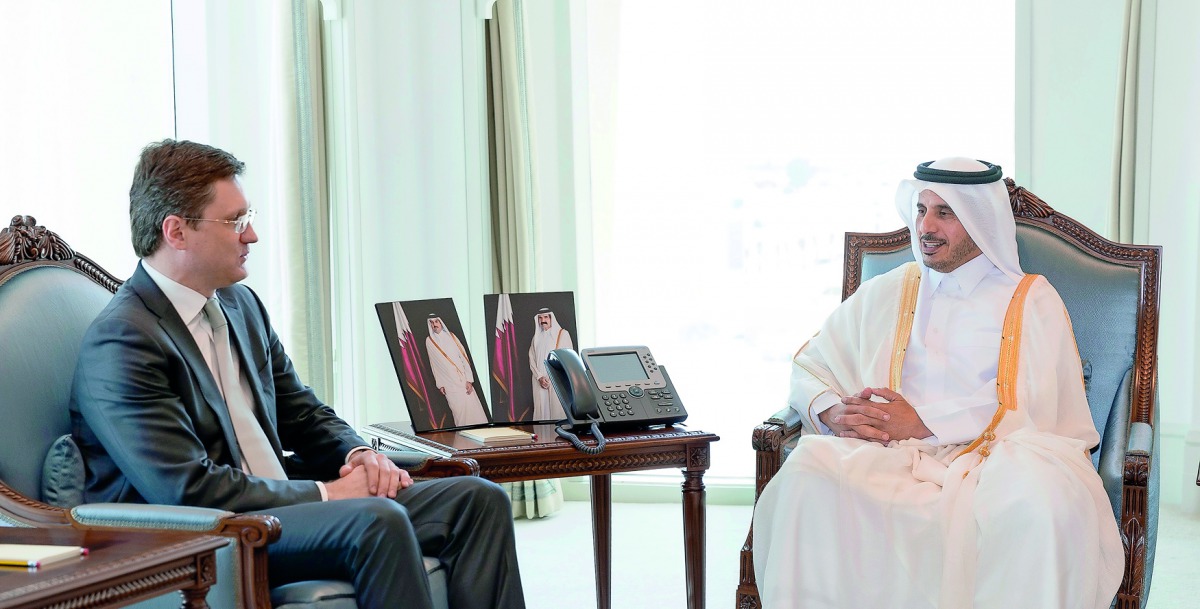 Prime Minister and Interior Minister H E Sheikh Abdullah bin Nasser bin Khalifa Al Thani with the Minister of Energy of the Russian Federation, Alexander Novak, in Doha yesterday. Talks dealt with bilateral relations and ways of enhancing them, mainly in 