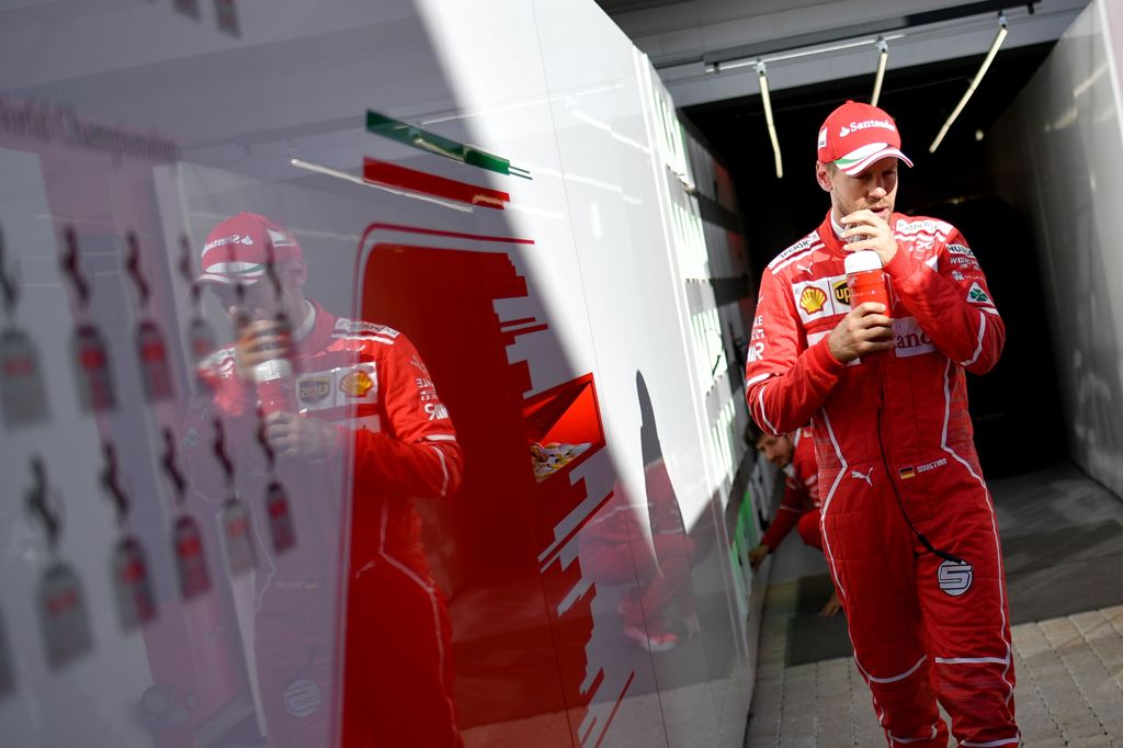 Ferrari's German driver Sebastian Vettel walks after the second practice session of the Formula One Russian Grand Prix at the Sochi Autodrom circuit in Sochi on April 28, 2017. / AFP / ANDREJ ISAKOVIC