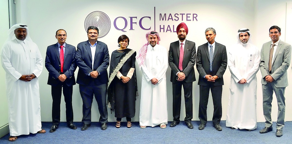 Yousuf Mohamed Al Jaida (centre), CEO, QFC Authority; UPS Madan (fourth right), Metropolitan Commissioner, MMRDA; and P Kumaran (third right), Indian Ambassador to Qatar, with other officials during the MoU signing ceremony at QFC headquarters in Doha. 
