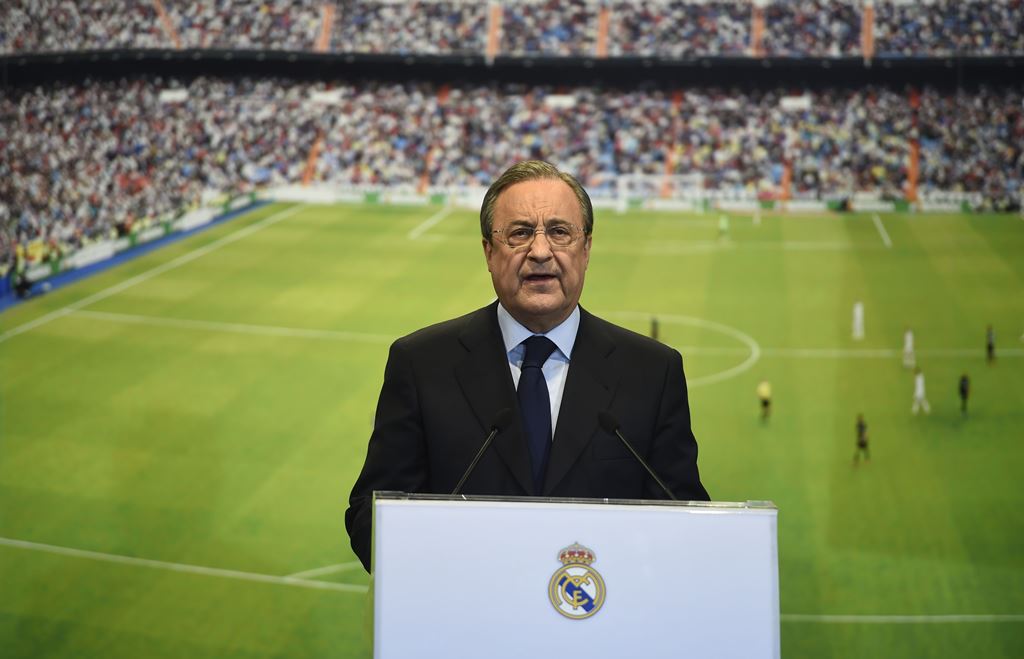 (FILES) This file photo taken on July 22, 2014 at the Santiago Bernabeu stadium in Madrid shows Real Madrid's President Florentino Perez speaking during the presentation of Colombian striker formerly at AS Monaco James Rodriguez. AFP / PIERRE-PHILIPPE MAR