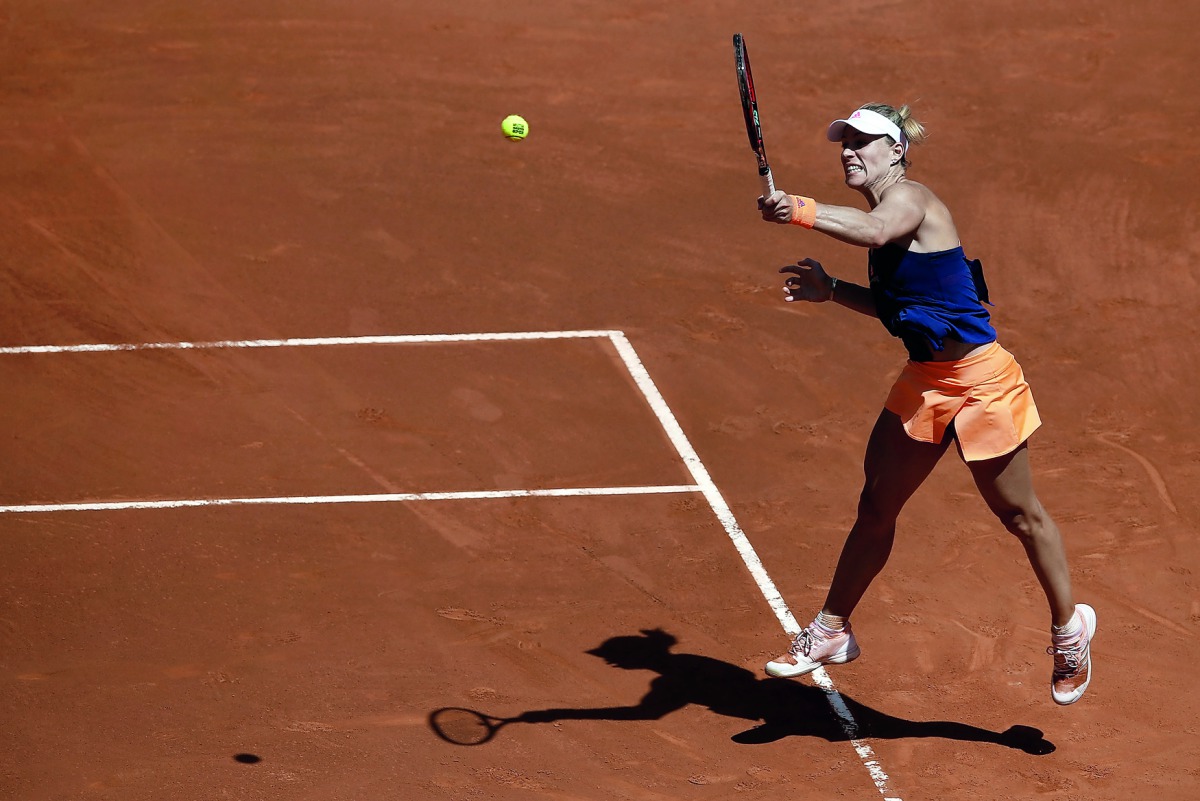 Angelique Kerber of Germany returns the ball during her match against  Katerina Siniakova of the Czech Republic at the Madrid Open in  Madrid, Spain.
