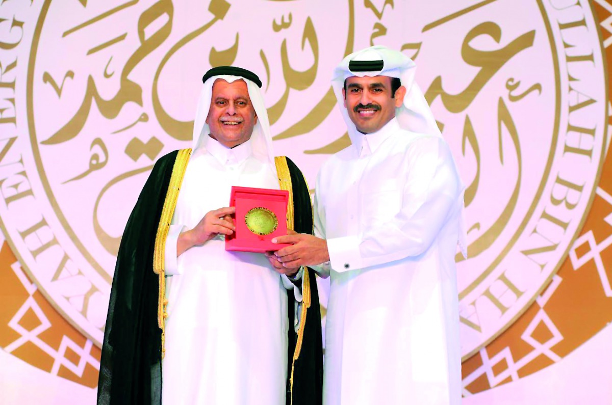 
Abdullah bin Hamad Al Attiyah (left) presenting an award to Saad Al Kaabi, President and CEO of Qatar Petroleum, at 'The 5th Abdullah Bin Hamad Al-Attiyah International Energy Awards 2017' at  Sheraton Grand Doha Resort & Convention Hotel, yesterday.  P