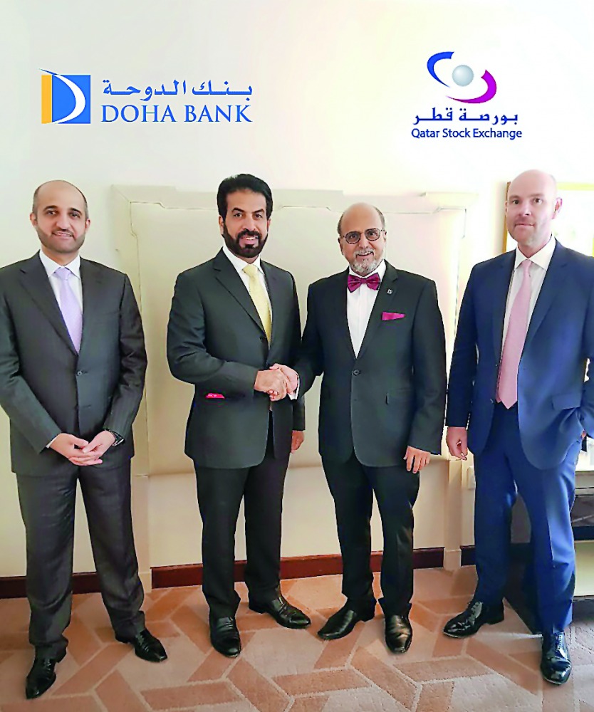 Rashid Ali Al Mansoori (second left), CEO of QSE and Dr R Seetharaman (second right), CEO Doha Bank and other officials at the event in New York Palace Hotel in New York, yesterday. 