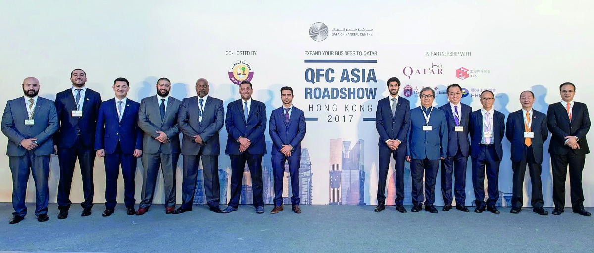 Members of Qatar Financial Centre (QFC) Authority with the Ambassadors for Qatar and Kuwait pose for a group photo at QFC Asia Roadshow, in Singapore.
