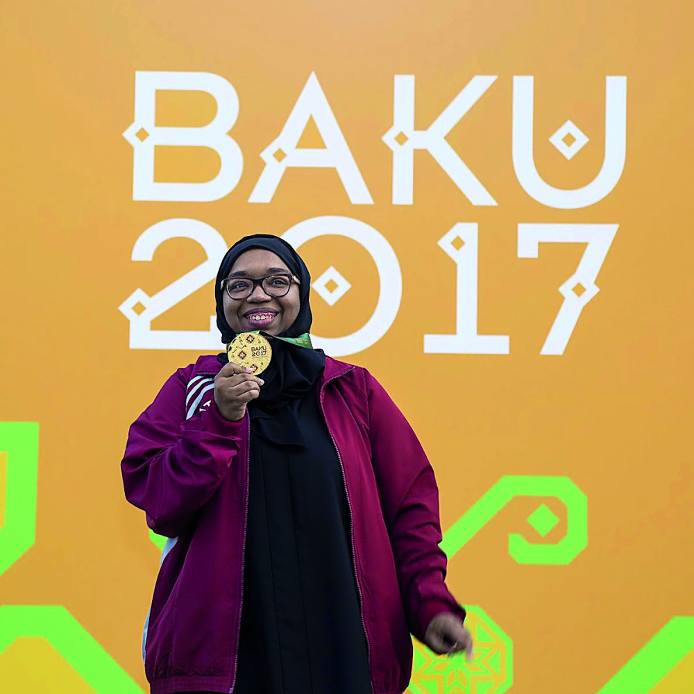 Dana Saad Al Mubarak with her gold medal