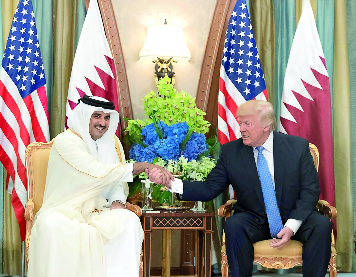 Emir H H Sheikh Tamim bin Hamad Al Thani shaking hands with US President Donald Trump in the Saudi capital.